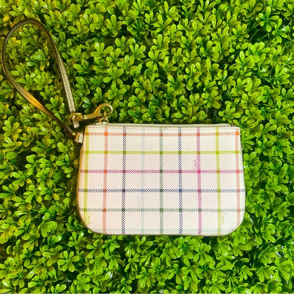 Coach Handbags - Coach Cream and Plaid Wristlet with Gold Colored Trim